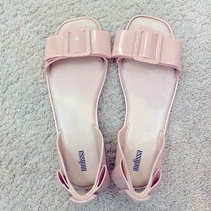 Melissa glitter pink jelly bow slides. Size 9. Some natural wear to the heels.